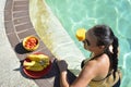 Girl enjoying in the pool