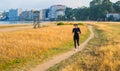 girl enjoying running on a beatiful road