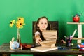 Girl with enthusiastic face takes book. Back to school Royalty Free Stock Photo