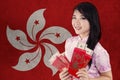 Girl with envelope and flag of Hong Kong Royalty Free Stock Photo