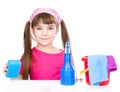 Girl with equipment for cleaning the house. isolated on white Royalty Free Stock Photo