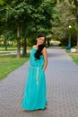 Girl in evening dress in the Park