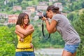 Girl exercises to photograph a portrait during a photography course
