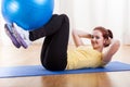 Girl exercising with gym ball Royalty Free Stock Photo