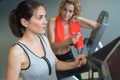 Girl exercising at gym on stepper machine