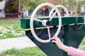 Girl exercising at outdoors gym playground equipment Royalty Free Stock Photo