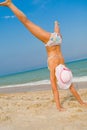 Girl exercising at sea beach Royalty Free Stock Photo