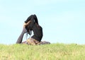 Girl exercising yoga - pigeon pose