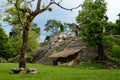 Girl explores archaeological structure in the ancient Mayan city