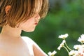 Girl exploring flower