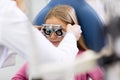 Girl at eye doctor Royalty Free Stock Photo