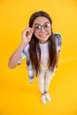 girl with eyesight glasses and checkered shirt. teenage girl wear eyesight glasses. teenage girl can see with eyesight Royalty Free Stock Photo