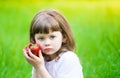 Girl face, strawberry, sad blue eyes, close up