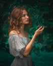 The girl in the fairy-tale garden Royalty Free Stock Photo