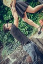 Girl falling caught by boyfriend. Royalty Free Stock Photo