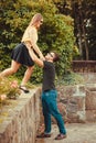 Girl falling caught by boyfriend. Royalty Free Stock Photo