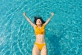 The girl falls back into the pool. Good mood. Weekend at the water park Royalty Free Stock Photo