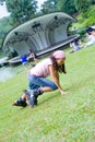 Girl falls while roller blading in the park Royalty Free Stock Photo