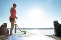 Girl family man woman are doing yoga on a sup Royalty Free Stock Photo