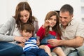 Girl With Family Showing House Key