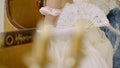 Dances of the 19th century. Lady with a fan at a ball, costumes from the 18th century. Victorian woman in a ball gown Royalty Free Stock Photo