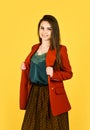 Girl fashion model harmoniously balanced outfit skirt and jacket, stylist advice concept