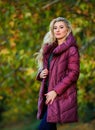 Girl fashionable blonde walk autumn park. Jackets everyone should have. Best puffer coat to buy. How pick jacket. Puffer