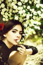 Girl with fashionable spanish makeup, rose flower in hair Royalty Free Stock Photo