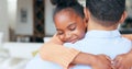 Girl, father and hug in closeup, back and family home with welcome, reunion and smile with love in living room. African