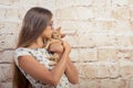 Girl with a favorite kitten.