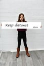 Girl holding billboard keep distance Royalty Free Stock Photo