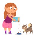 Girl feeding cat. Kid pouring food in pet bowl Royalty Free Stock Photo