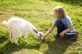 Girl Feeding Goat 2 Royalty Free Stock Photo