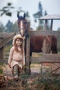 Girl feeding her horse Royalty Free Stock Photo