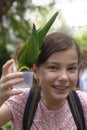 Girl feeding parrots Royalty Free Stock Photo