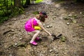 A girl feeding a red squirell in the forest, Skole Beskids National Nature Park, Ukraine Royalty Free Stock Photo