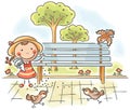 Girl feeding sparrows in the park