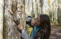 Girl feeding squirrel in autumn park, close-up Royalty Free Stock Photo