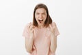 Girl feeling betrayed, shouting during fight, having quarrel. Portrait of hateful and outraged woman, telling Royalty Free Stock Photo
