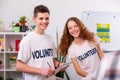 Girl feeling good while sorting waste with her best friend