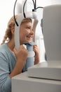 Girl feeling joyful while having ophthalmologist consultation Royalty Free Stock Photo