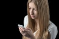 Girl feels depressed after reading bad sms on her mobile phone