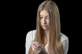 Girl feels depressed after reading bad sms on her mobile phone