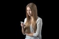Girl feels depressed after reading bad sms on her mobile phone