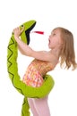 Girl fights with toy snake
