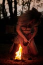 Girl fire dancing performance at outdoor art festival, smooth blurred movements of female