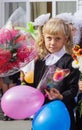 Girl first grader at the school on September 1 lineup