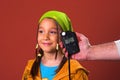 Girl and flash meter Royalty Free Stock Photo