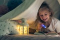 Girl with a flashlight Royalty Free Stock Photo