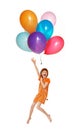 The girl flies on balloons